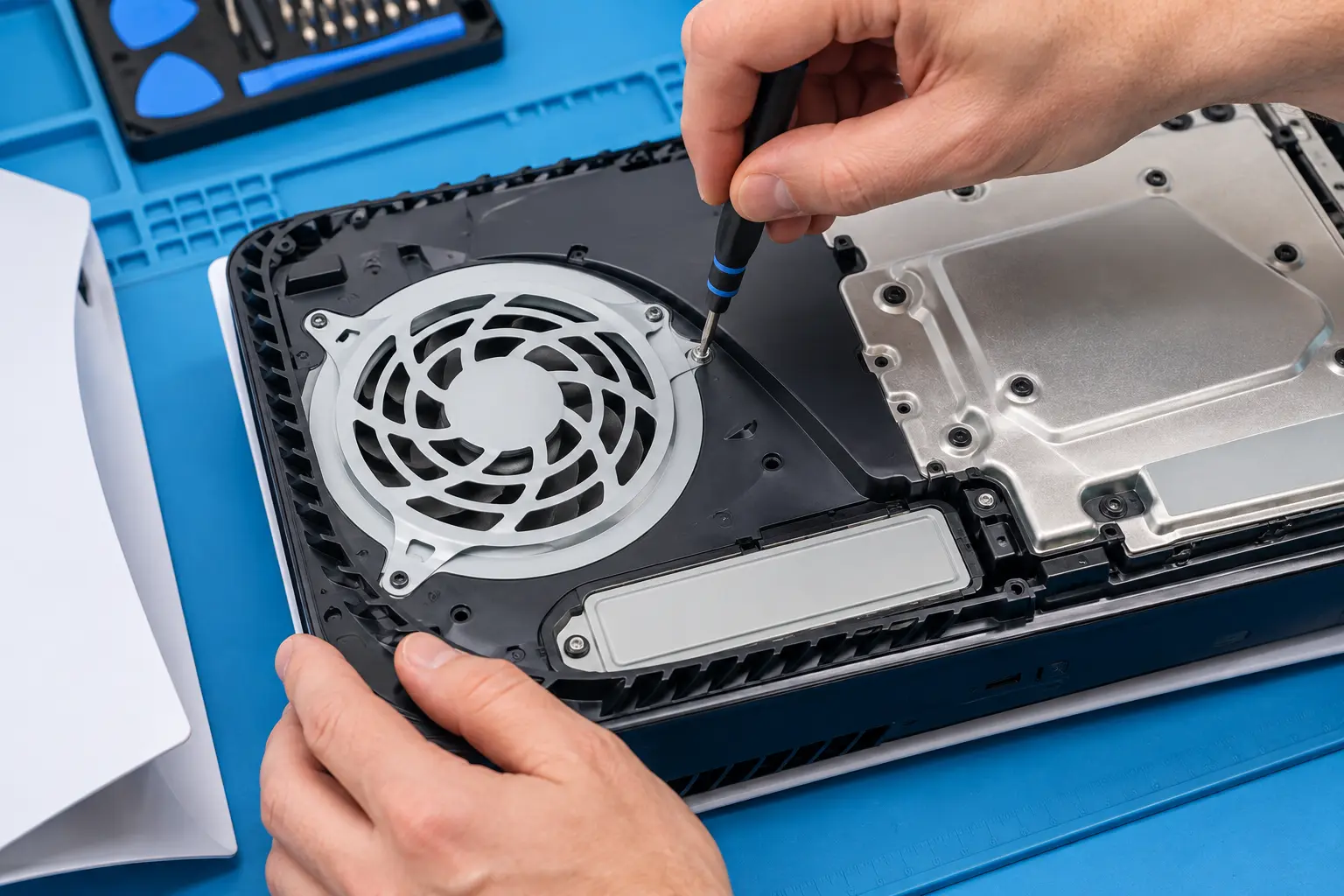 Illustrative image of work on an opened PS5 console