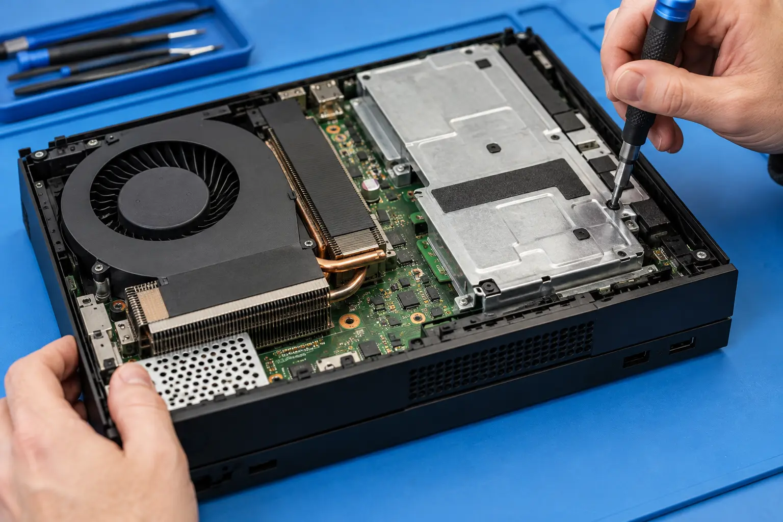 Illustrative image of work on an opened Xbox console